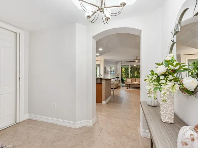 a view of a living room and a potted plant