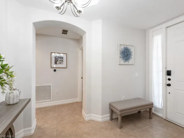 a view of a hallway with workspace