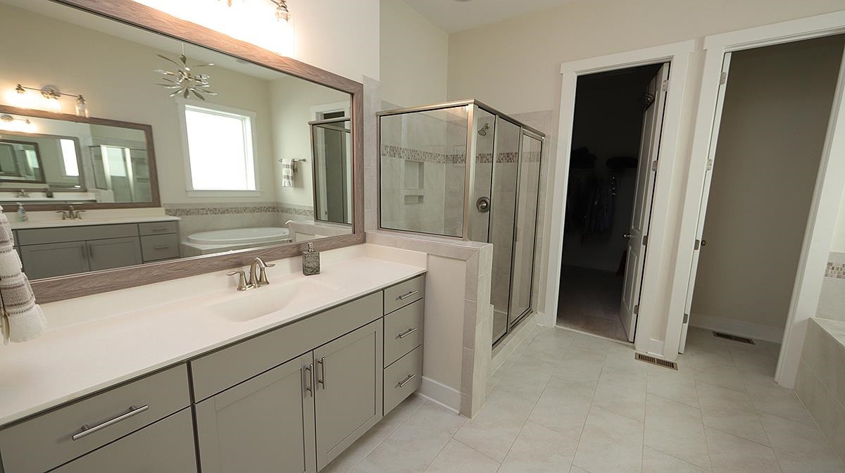 5526 Beardall Street Raleigh, NC 27616 - Photo 19 of 34 Large, bright Master Bath with Garden Tub and Walk in Shower. Master Bath/Spa