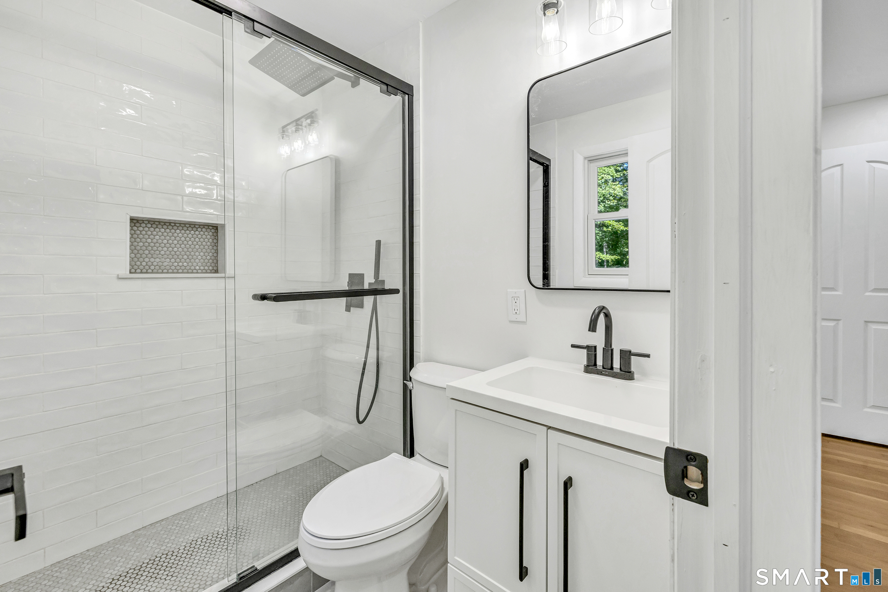 48 Crestwood Road Monroe, CT 06468 - Photo 21 of 32 a bathroom with a sink toilet and shower