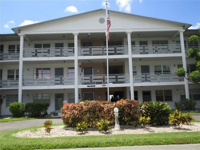 a front view of a building with yard