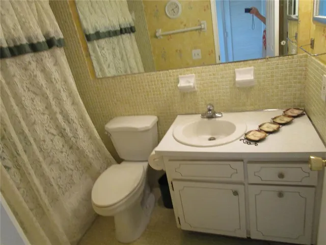 a bathroom with a sink and a toilet