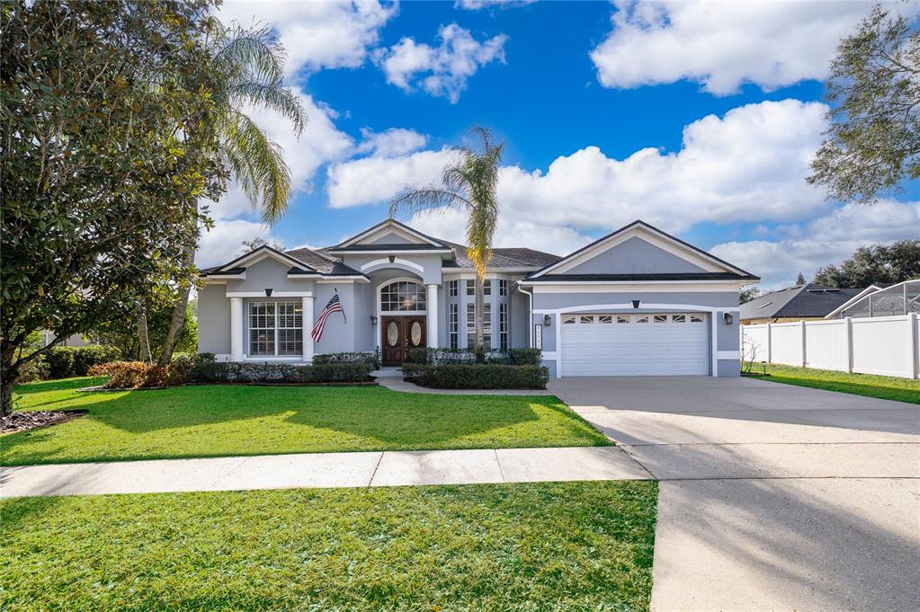 2277 Nectar Way Oviedo, FL 32765 - Photo 1 of 30 a front view of a house with a yard