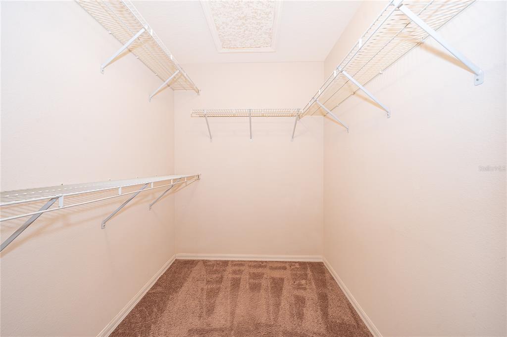 2277 Nectar Way Oviedo, FL 32765 - Photo 14 of 30 a view of a room with racks on the wall