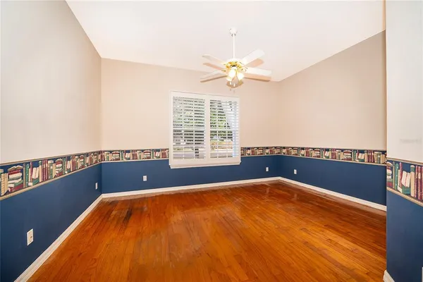 a view of a bedroom with a large window