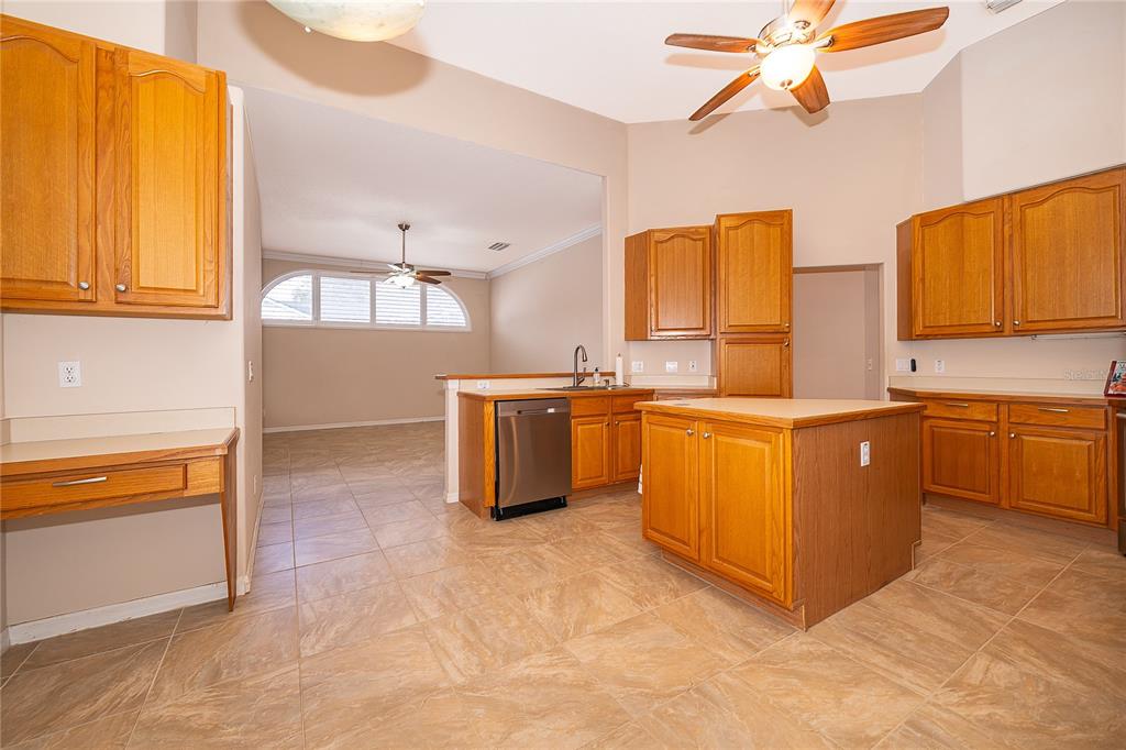 2277 Nectar Way Oviedo, FL 32765 - Photo 7 of 30 a kitchen with a sink and cabinets