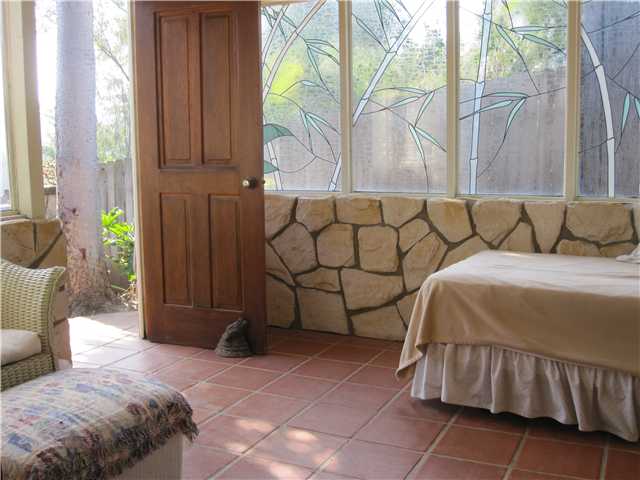 1320 Saxony Road Encinitas, CA 92024 - Photo 17 of 25 Sun room off master bath with door to front and back yard.
