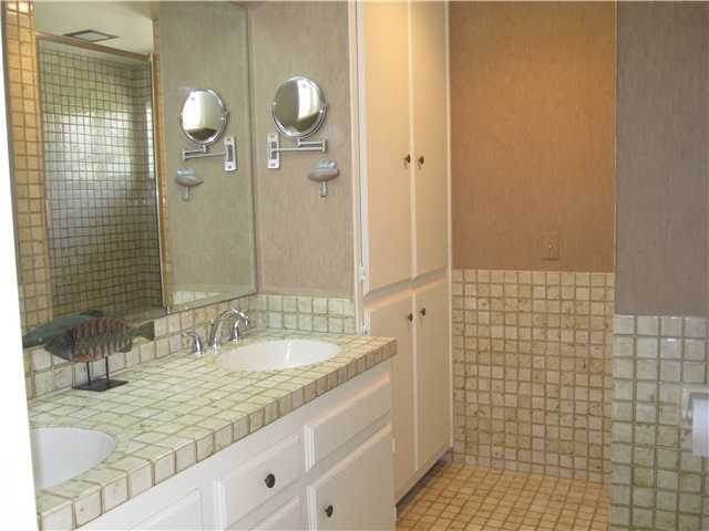 1320 Saxony Road Encinitas, CA 92024 - Photo 22 of 25 Upstairs bathroom has a tub/shower and bidete.