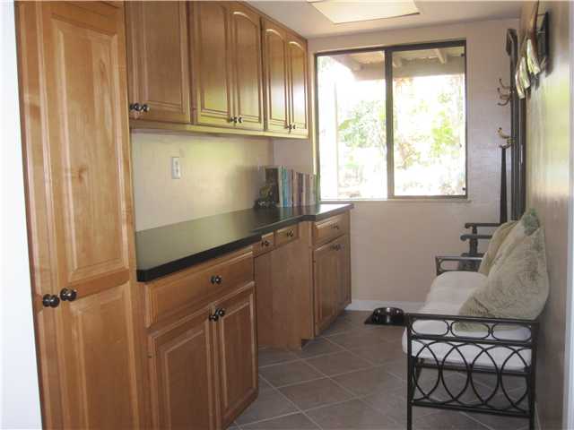 1320 Saxony Road Encinitas, CA 92024 - Photo 8 of 25 Pantry room with desk area. There are laundry hook ups here too.