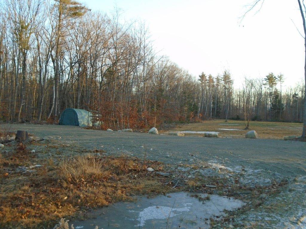 384 Sand Hill Road Smithfield, ME 04978 - Photo 2 of 12 Turn around and temp garage shelter