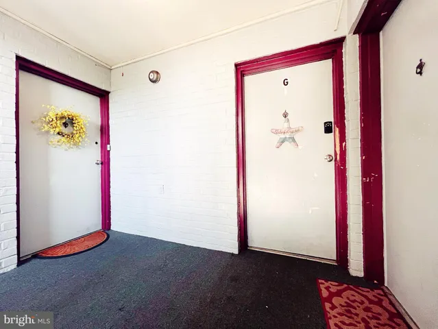 a view of elevator with hallway