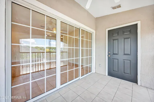 a view of a large window with an outdoor space