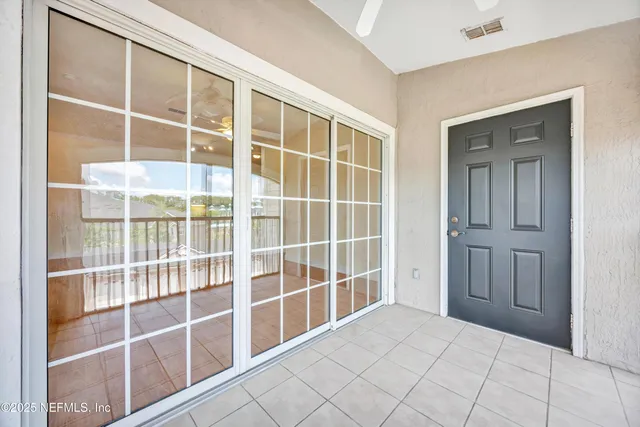 a view of a large window with an outdoor space