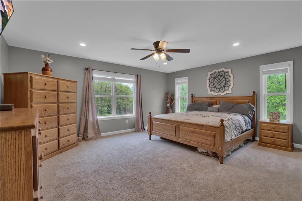 560 Bash Road Indiana, PA 15701 - Photo 12 of 25 a spacious bedroom with a bed and a table in it