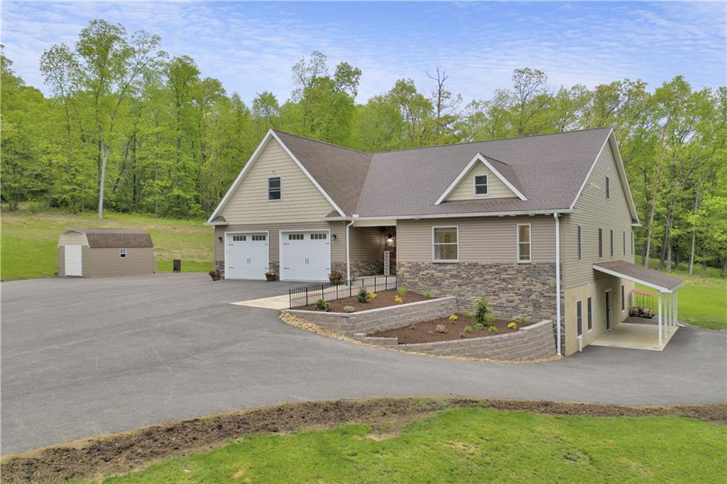 560 Bash Road Indiana, PA 15701 - Photo 2 of 25 a front view of a house with garden