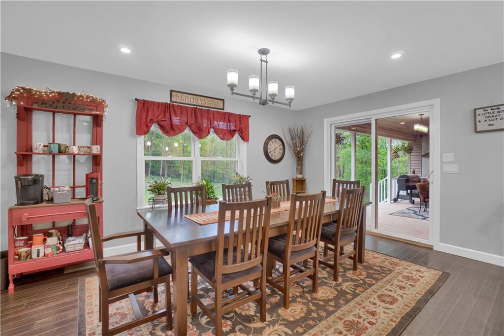 560 Bash Road Indiana, PA 15701 - Photo 5 of 25 a view of a dining room with furniture a chandelier and wooden floor