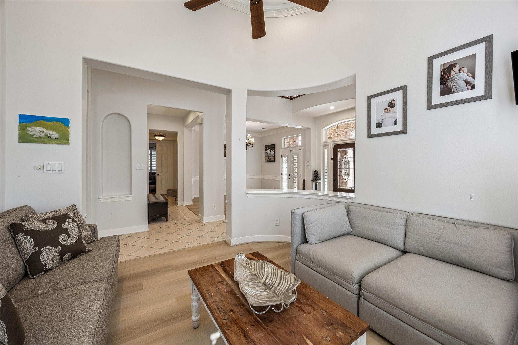 3047 Bonnebridge Way Boulevard Houston, TX 77082 - Photo 16 of 50 This formal living room provides seamless access to the dining area, making it an ideal space for hosting and entertaining.