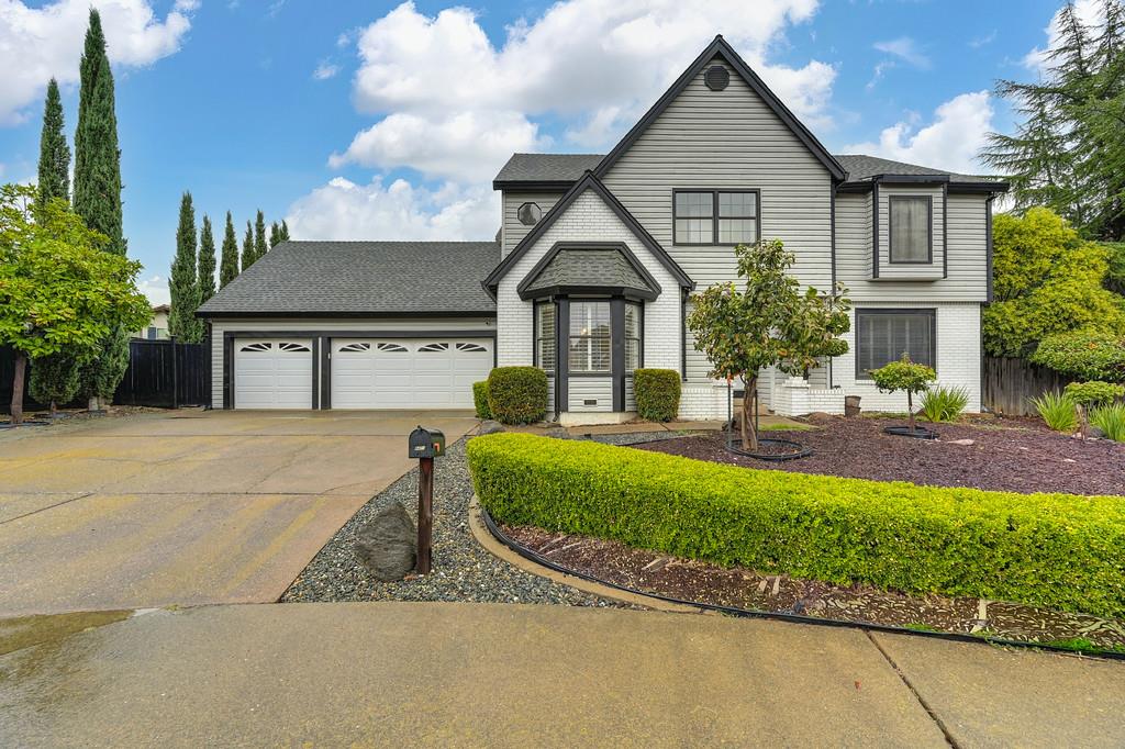 8477 Rick Mary Court Fair Oaks, CA 95628 - Photo 1 of 48 a front view of a house with a yard