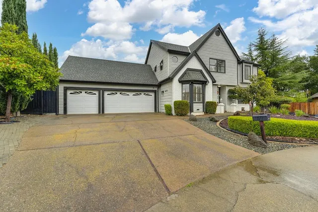 a house with yard in front of it