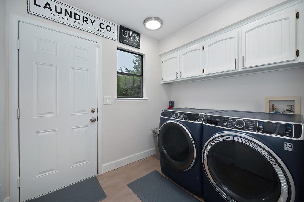 8477 Rick Mary Court Fair Oaks, CA 95628 - Photo 26 of 48 a utility room with sink dryer and washer