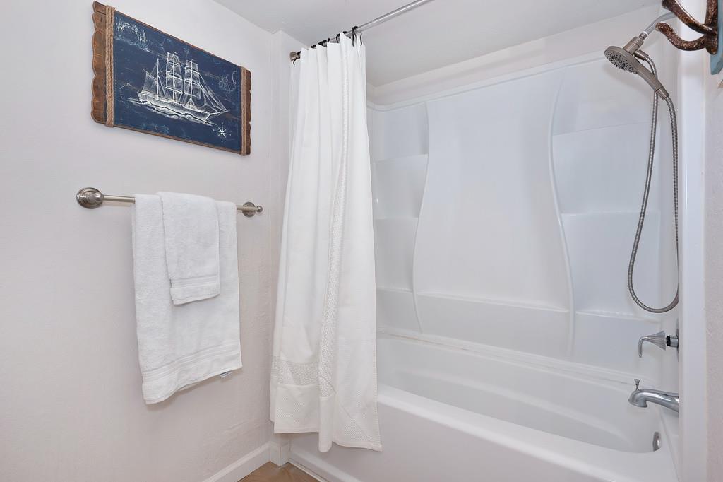 8477 Rick Mary Court Fair Oaks, CA 95628 - Photo 30 of 48 a bathroom with a shower