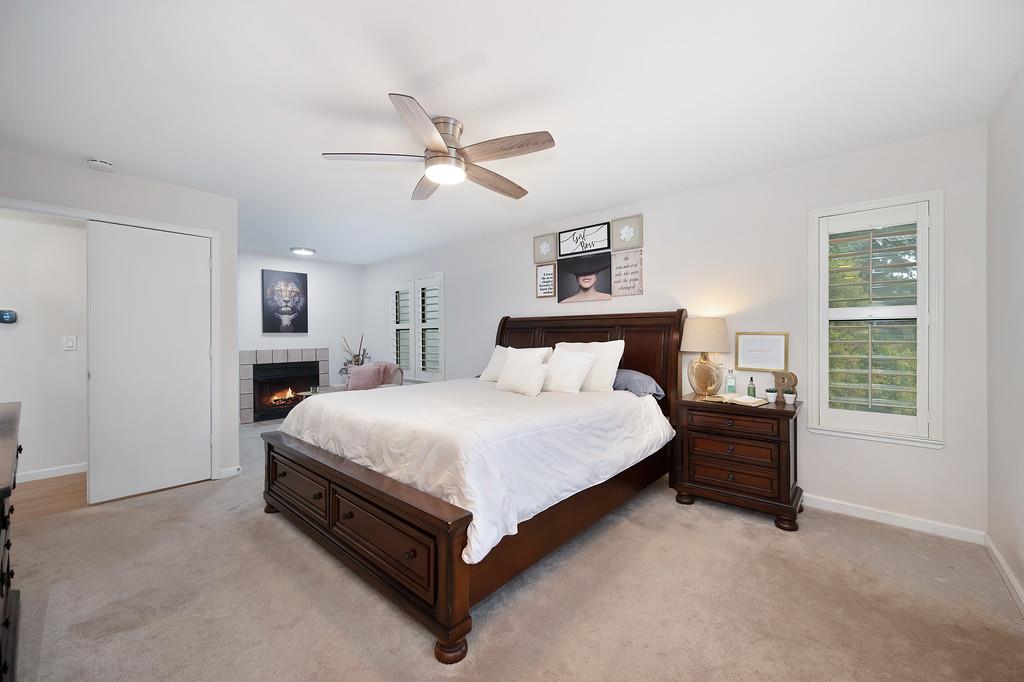 8477 Rick Mary Court Fair Oaks, CA 95628 - Photo 35 of 48 a bedroom with a bed and window