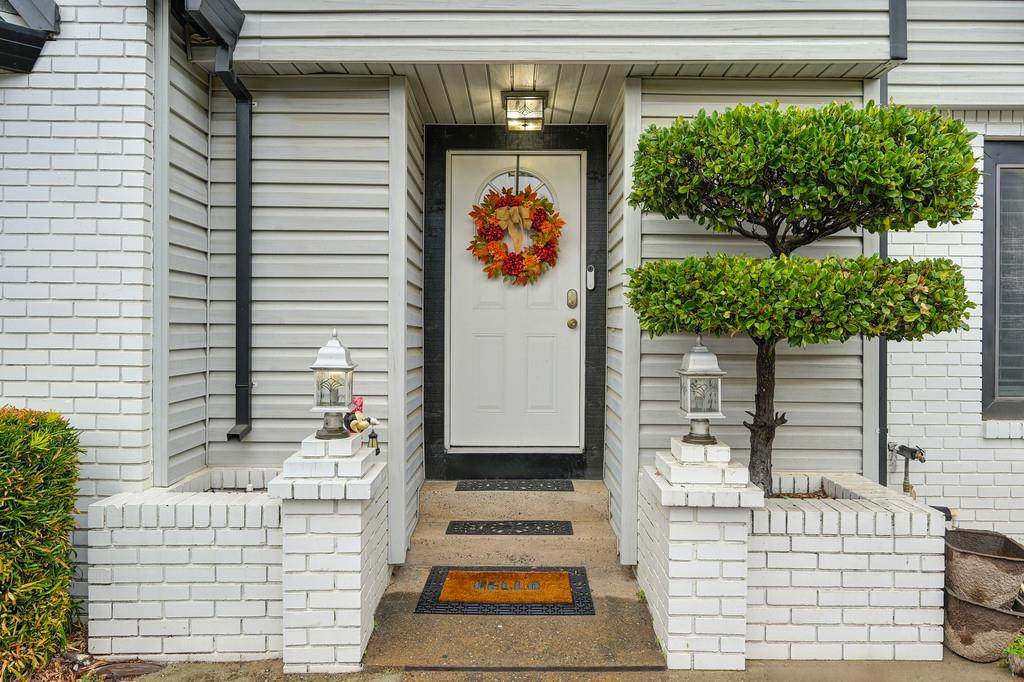 8477 Rick Mary Court Fair Oaks, CA 95628 - Photo 4 of 48 a front view of a house with large windows