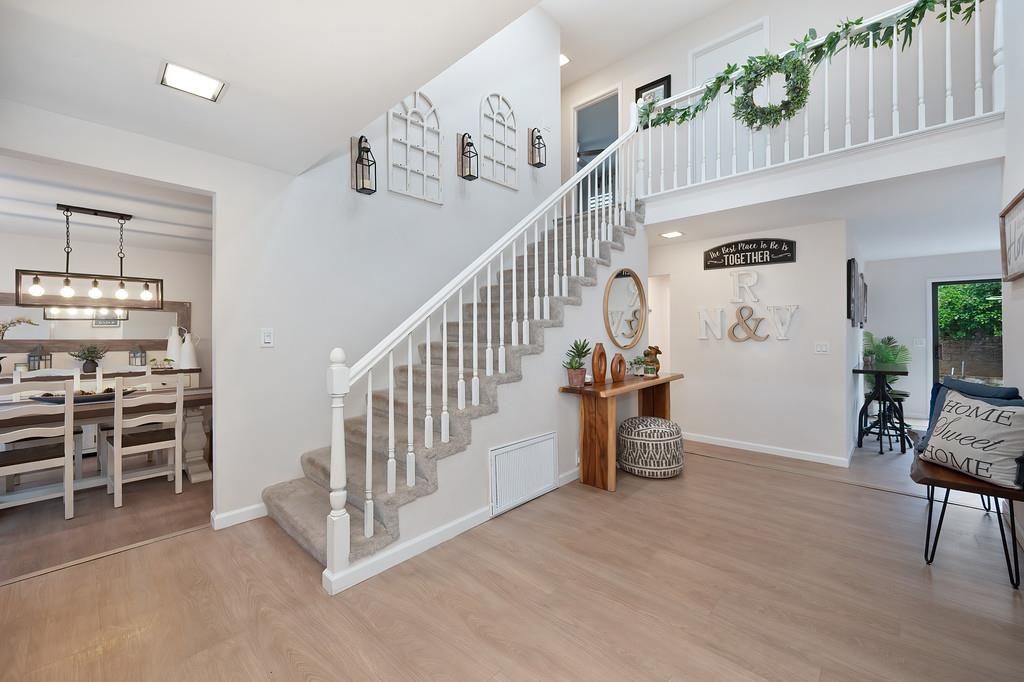 8477 Rick Mary Court Fair Oaks, CA 95628 - Photo 5 of 48 a view of a livingroom with furniture and staircase