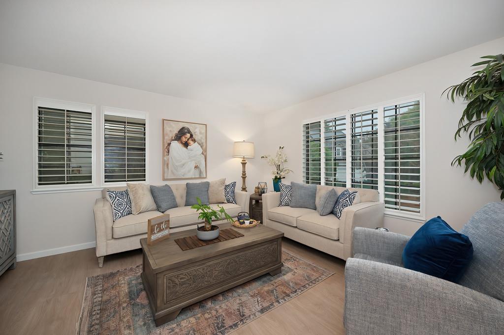 8477 Rick Mary Court Fair Oaks, CA 95628 - Photo 7 of 48 a living room with furniture and a large window