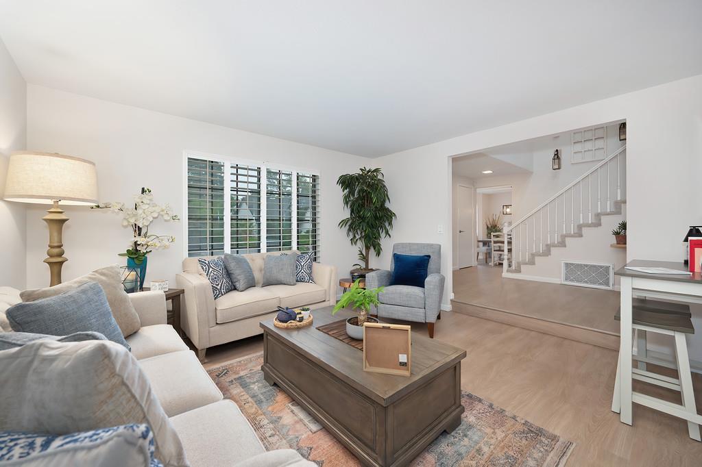 8477 Rick Mary Court Fair Oaks, CA 95628 - Photo 8 of 48 a living room with furniture and a large window