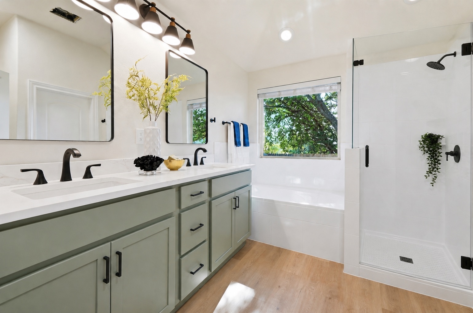 13009 Olivers Way Manchaca, TX 78652 - Photo 19 of 37 a bathroom with a double vanity sink mirror and shower