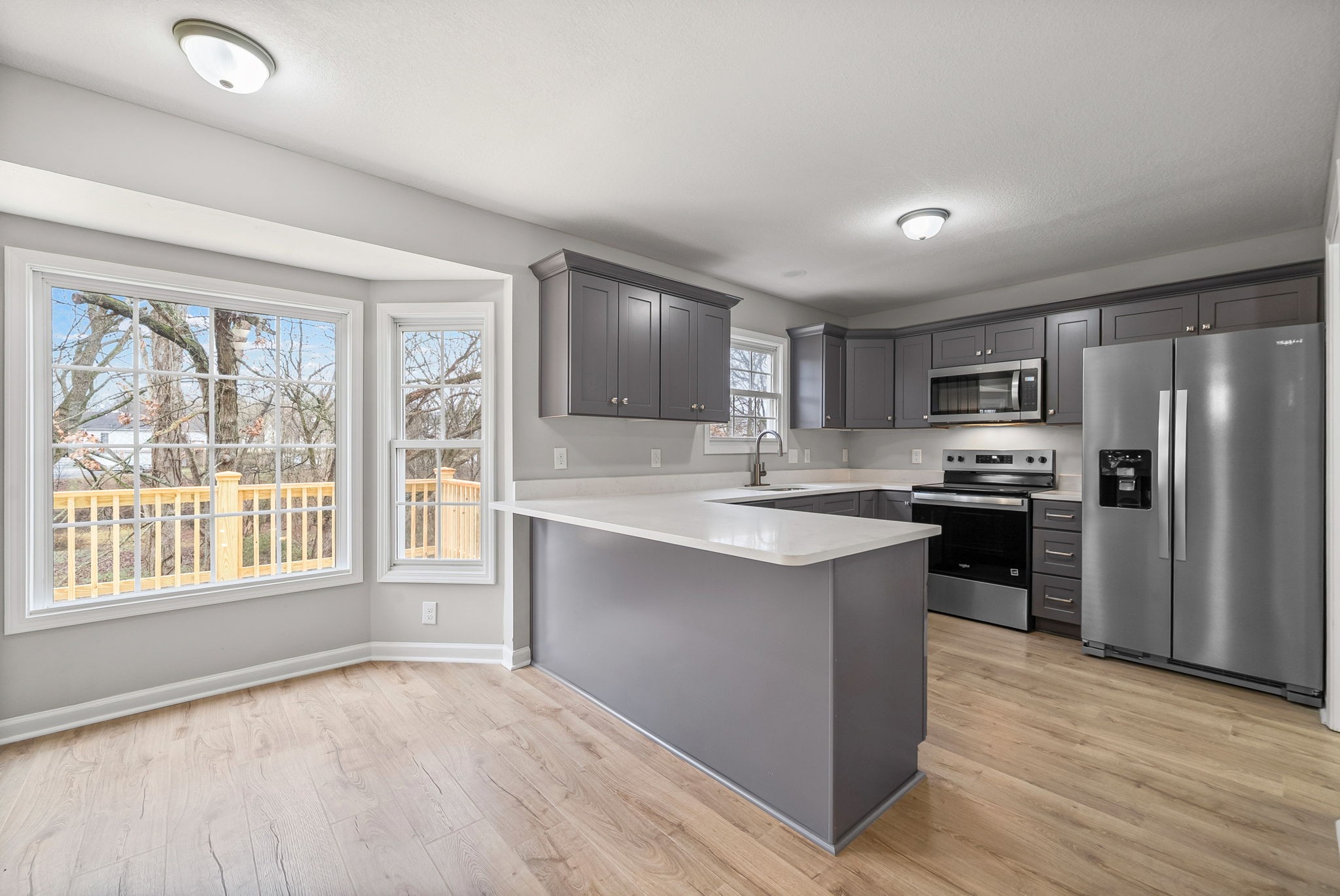 3118 Larson Lane Clarksville, TN 37043 - Photo 1 of 37 a kitchen with a stove a sink and a refrigerator