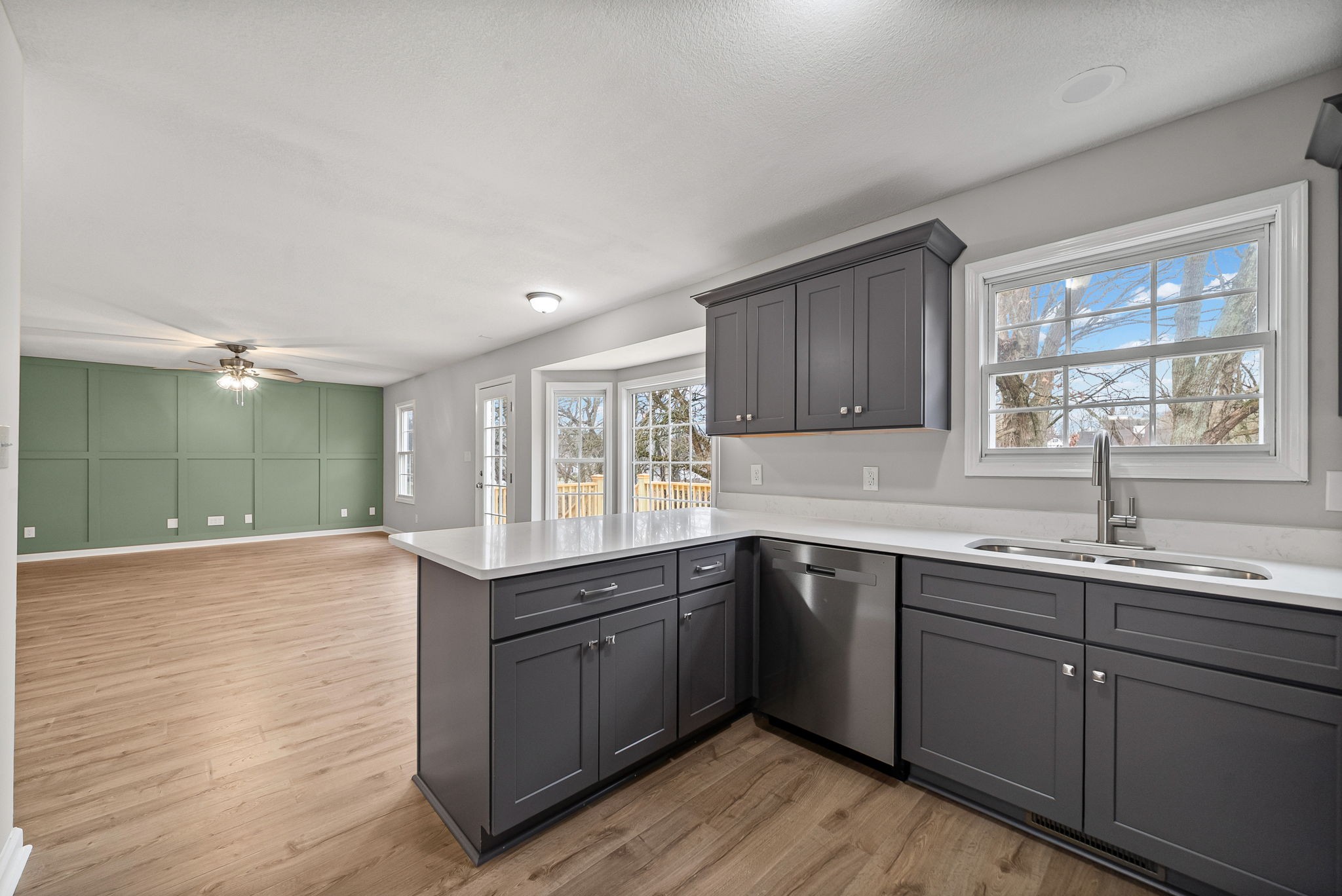 3118 Larson Lane Clarksville, TN 37043 - Photo 11 of 37 a kitchen with sink cabinets and wooden floor