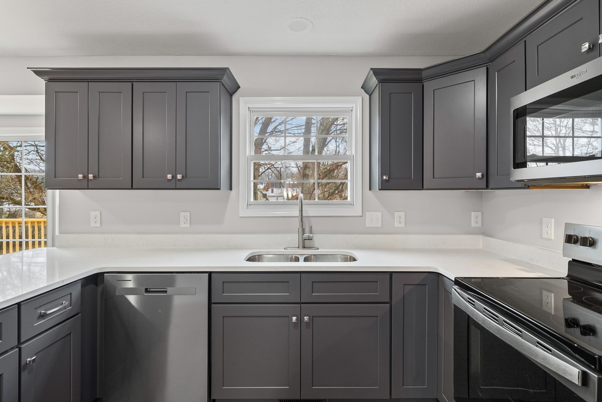 3118 Larson Lane Clarksville, TN 37043 - Photo 12 of 37 a kitchen with a sink cabinets and window