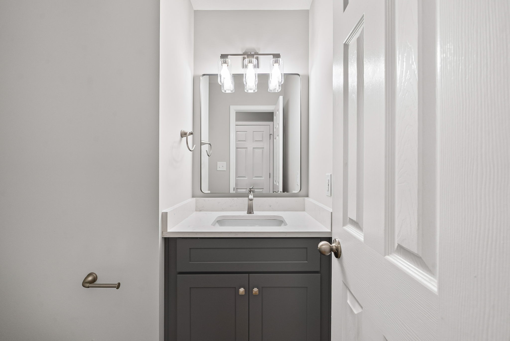 3118 Larson Lane Clarksville, TN 37043 - Photo 18 of 37 a bathroom with a sink and a mirror