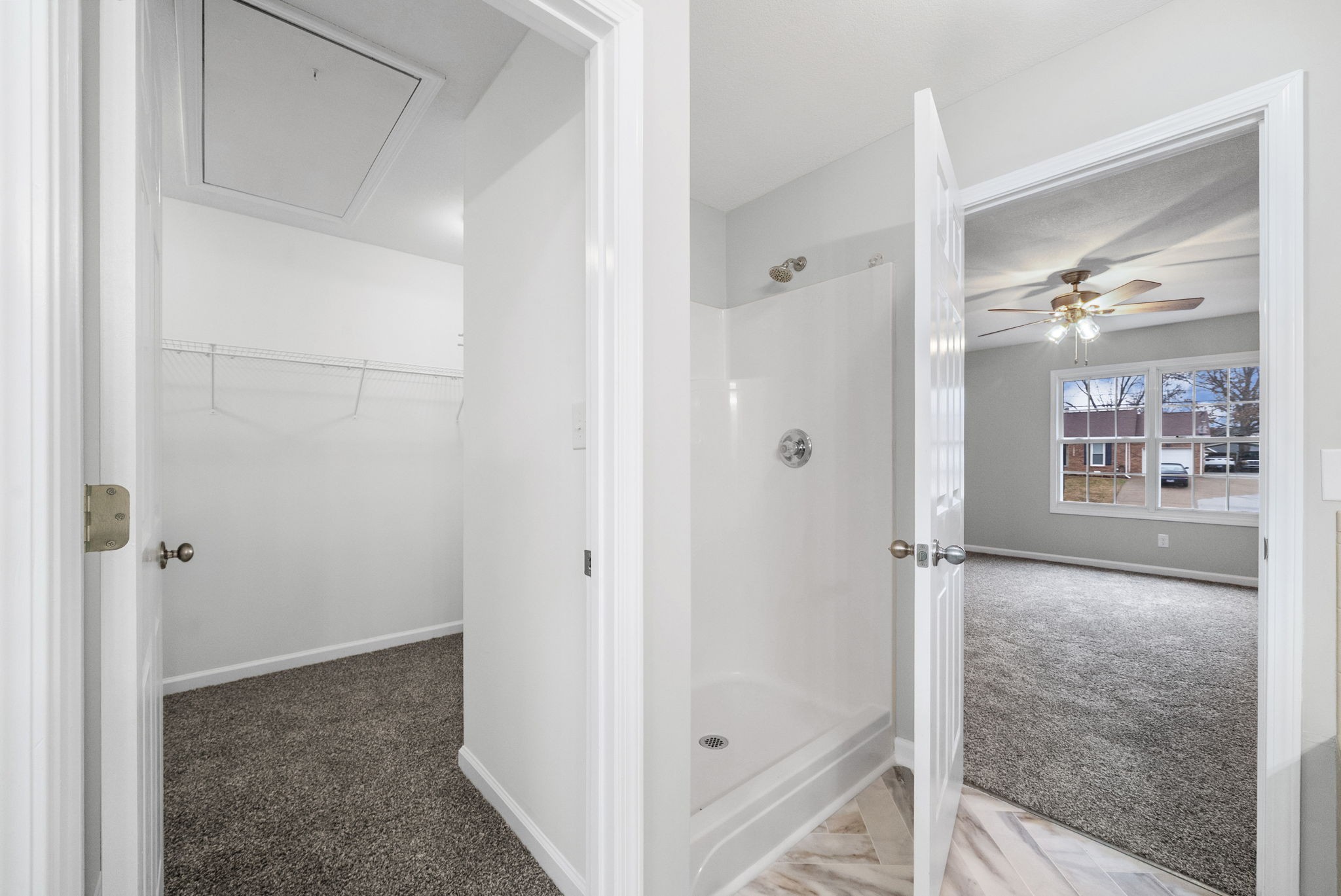 3118 Larson Lane Clarksville, TN 37043 - Photo 24 of 37 a bathroom with a glass shower door and a mirror