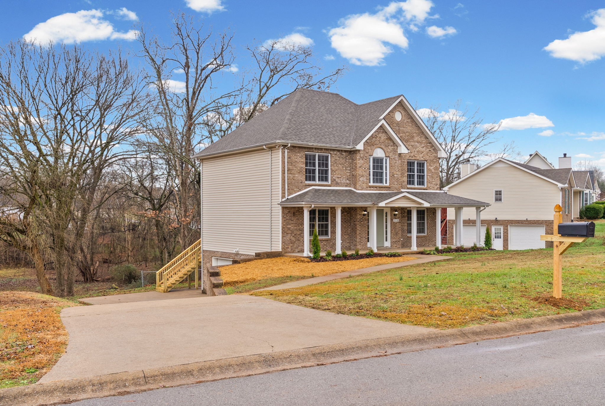 3118 Larson Lane Clarksville, TN 37043 - Photo 5 of 37 a front view of a house with a yard