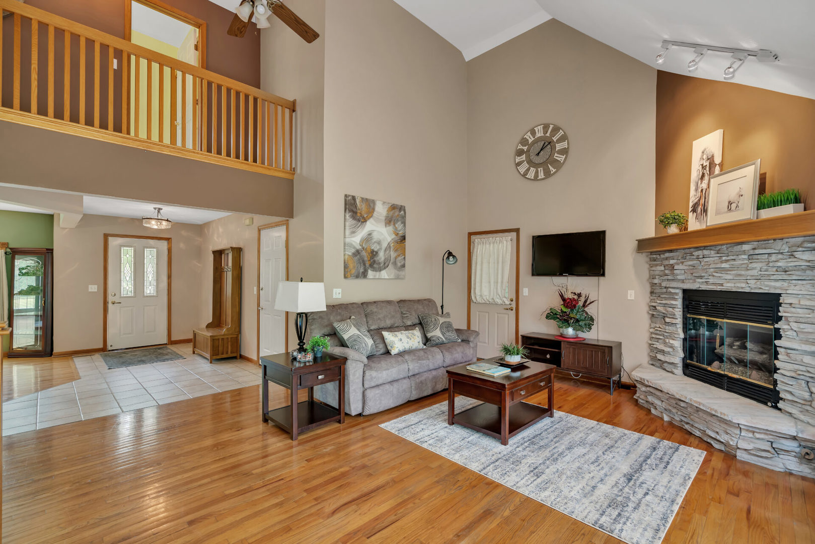 515 Boardman Circle Bolingbrook, IL 60440 - Photo 14 of 31 a living room with furniture and a fireplace