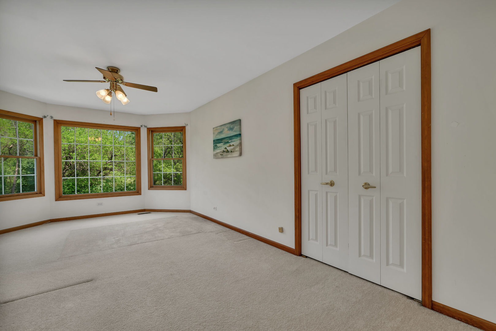 515 Boardman Circle Bolingbrook, IL 60440 - Photo 23 of 31 a view of a livingroom with a ceiling fan and window