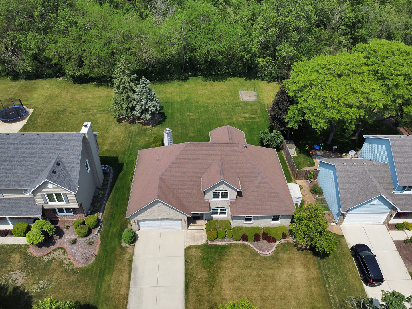 515 Boardman Circle Bolingbrook, IL 60440 - Photo 3 of 31 an aerial view of a house with a garden and lake view