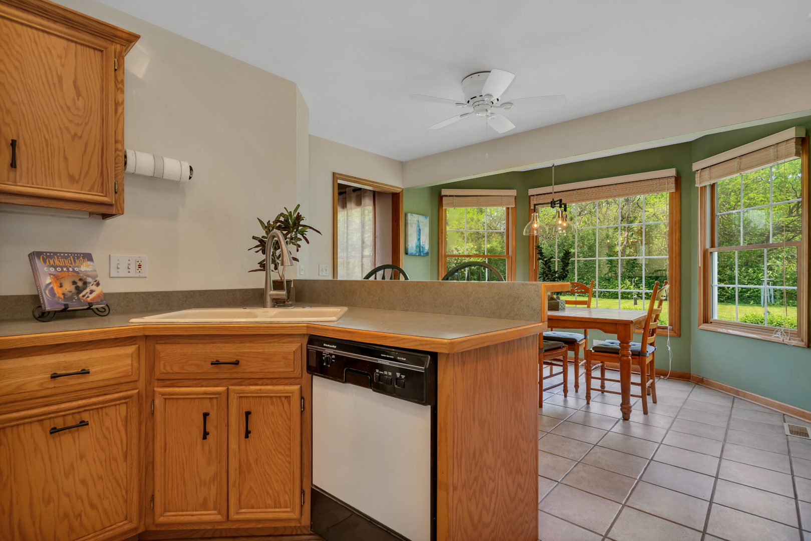 515 Boardman Circle Bolingbrook, IL 60440 - Photo 8 of 31 a view of a kitchen area with furniture and window