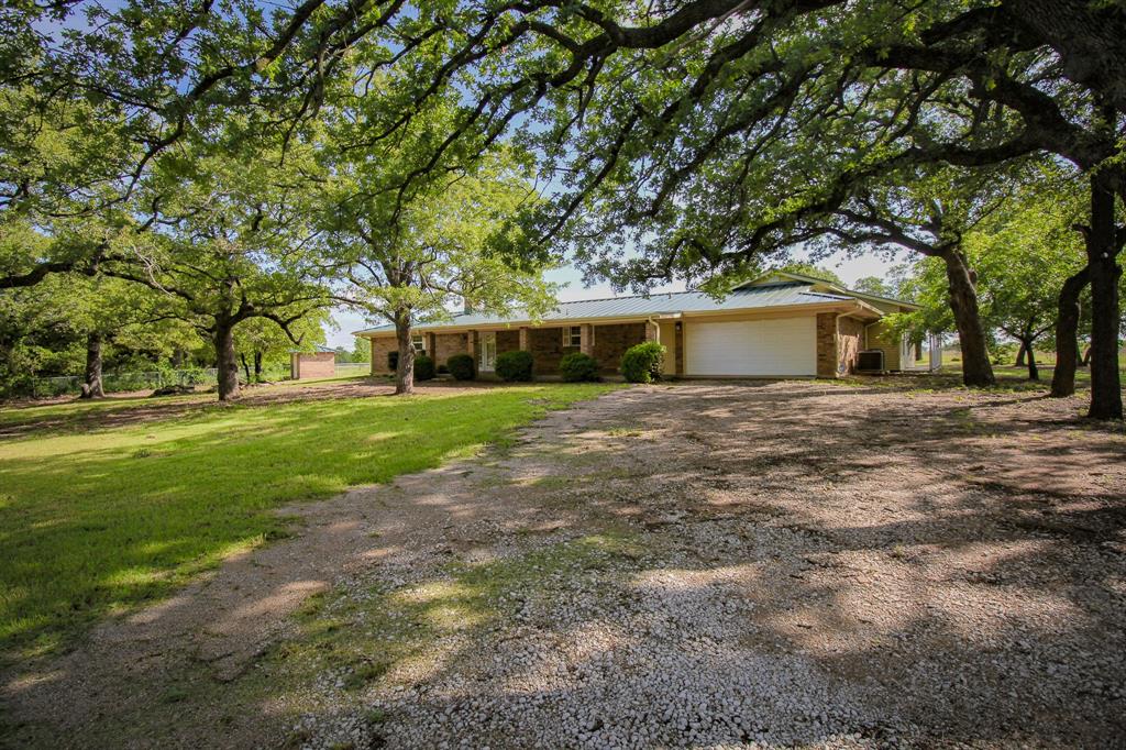 Tbd Crooked Creek Road Bowie, TX 76230 - Photo 7 of 35 a view of a house with a yard