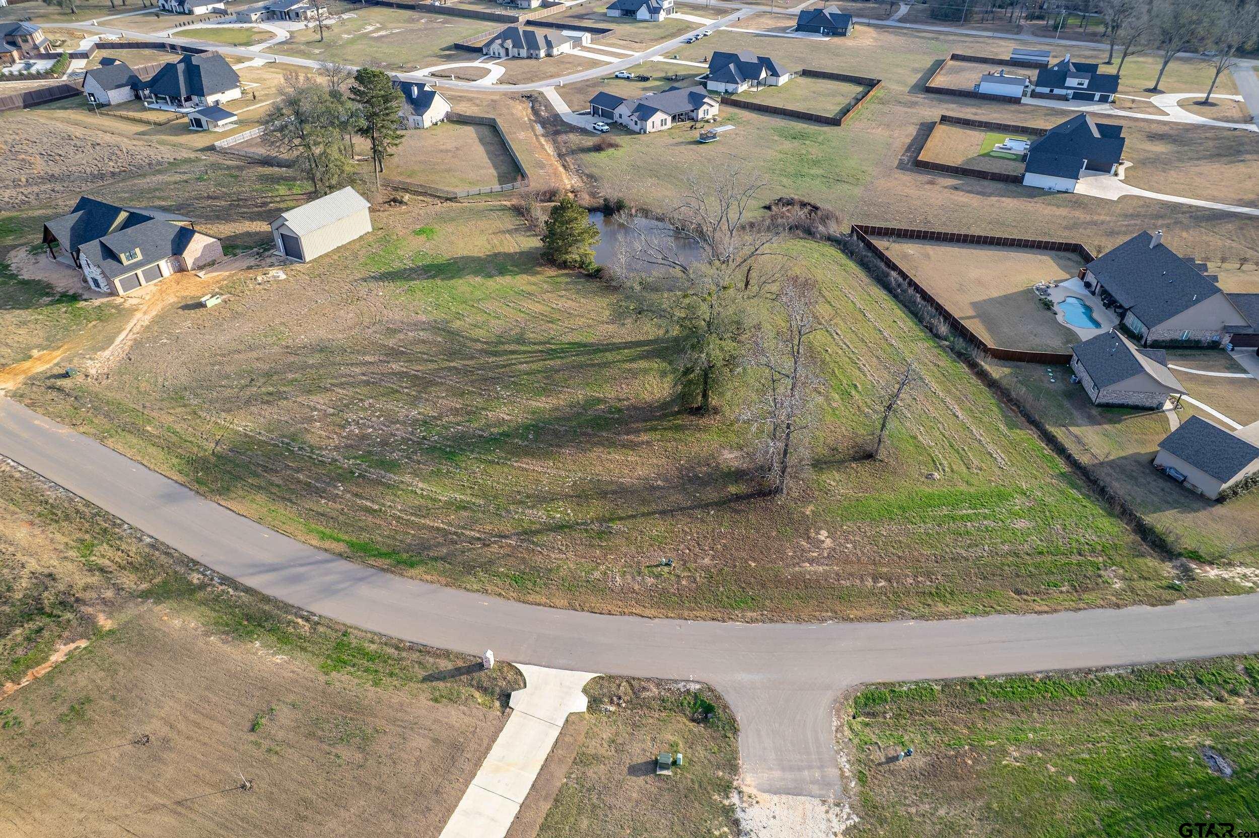 23149 Memory Lane Bullard, TX 75757 - Photo 4 of 6 a view of a house with a park