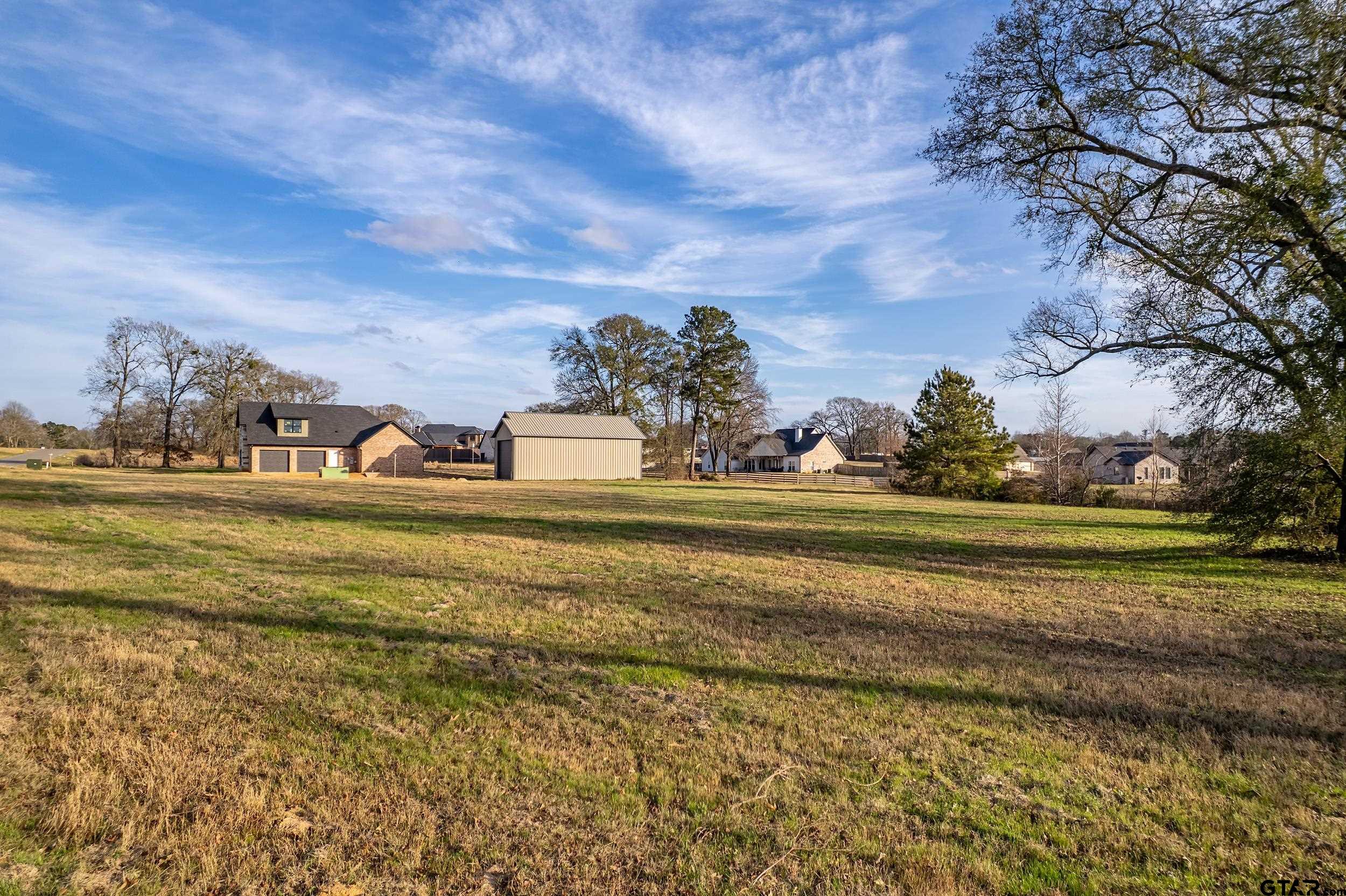 23149 Memory Lane Bullard, TX 75757 - Photo 5 of 6 a view of green field with house