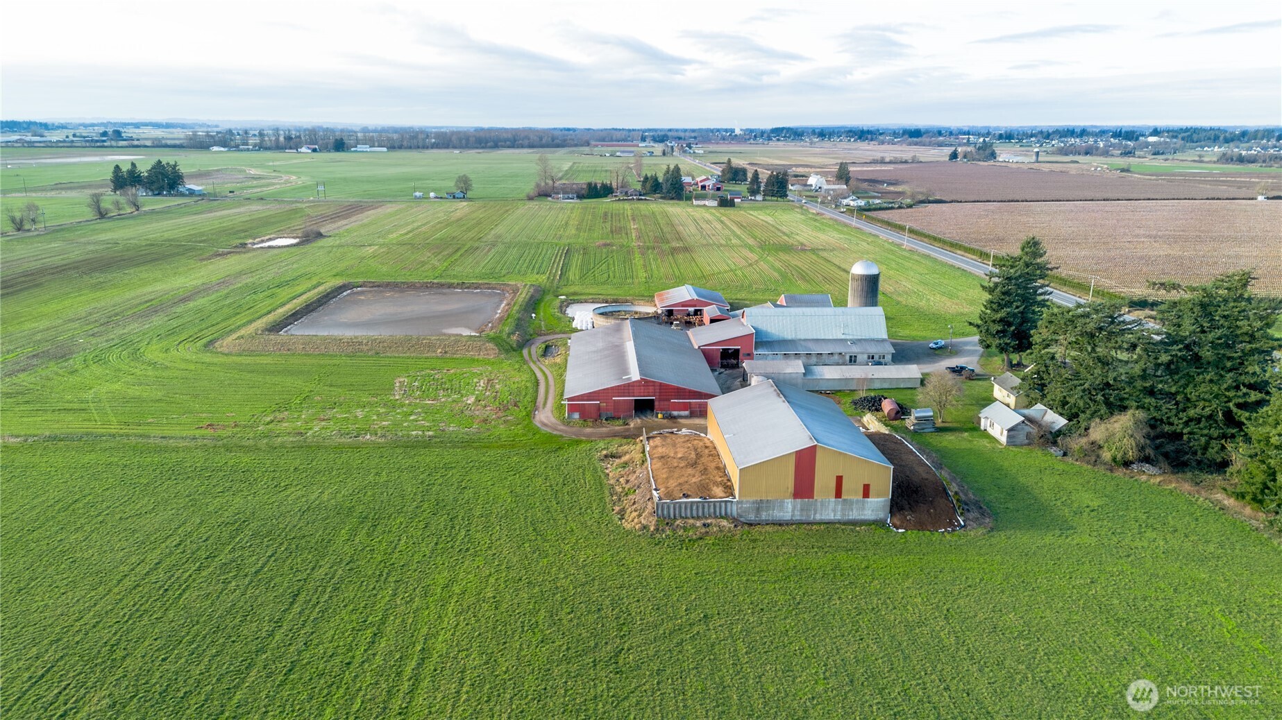 1915 Hampton Road Everson, WA 98247 - Photo 10 of 27 an aerial view of a house with a garden and lake view
