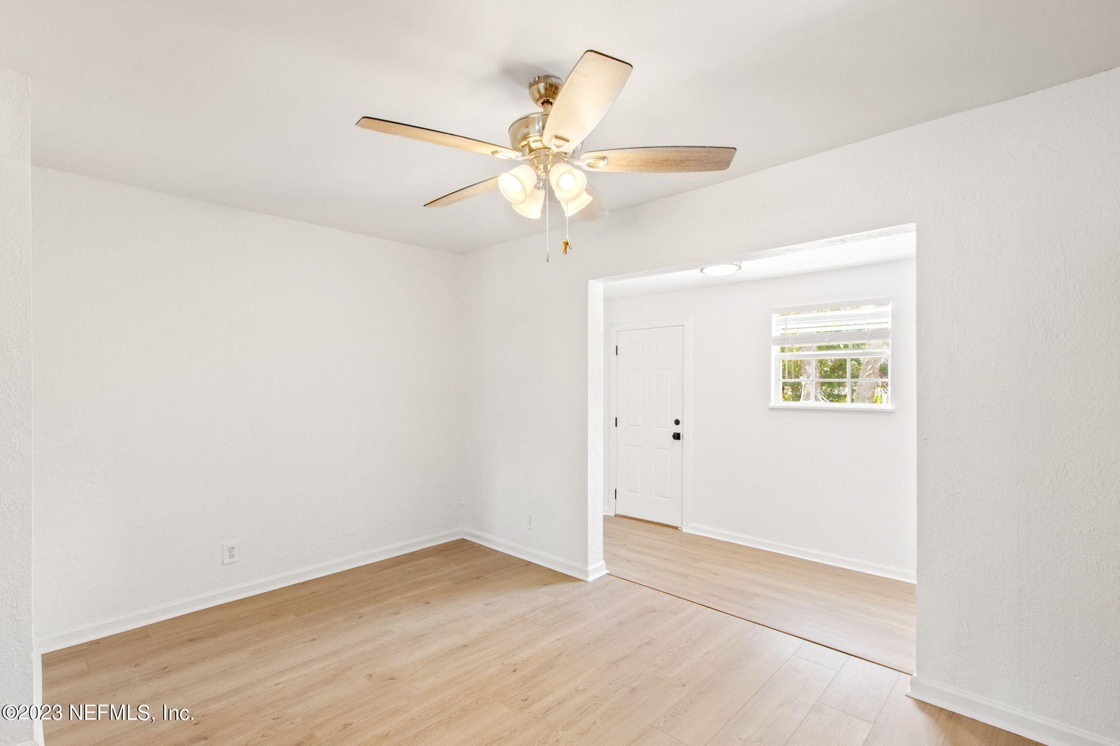 818 Cavalla Road Atlantic Beach, FL 32233 - Photo 12 of 27 an empty room with a window and a fan