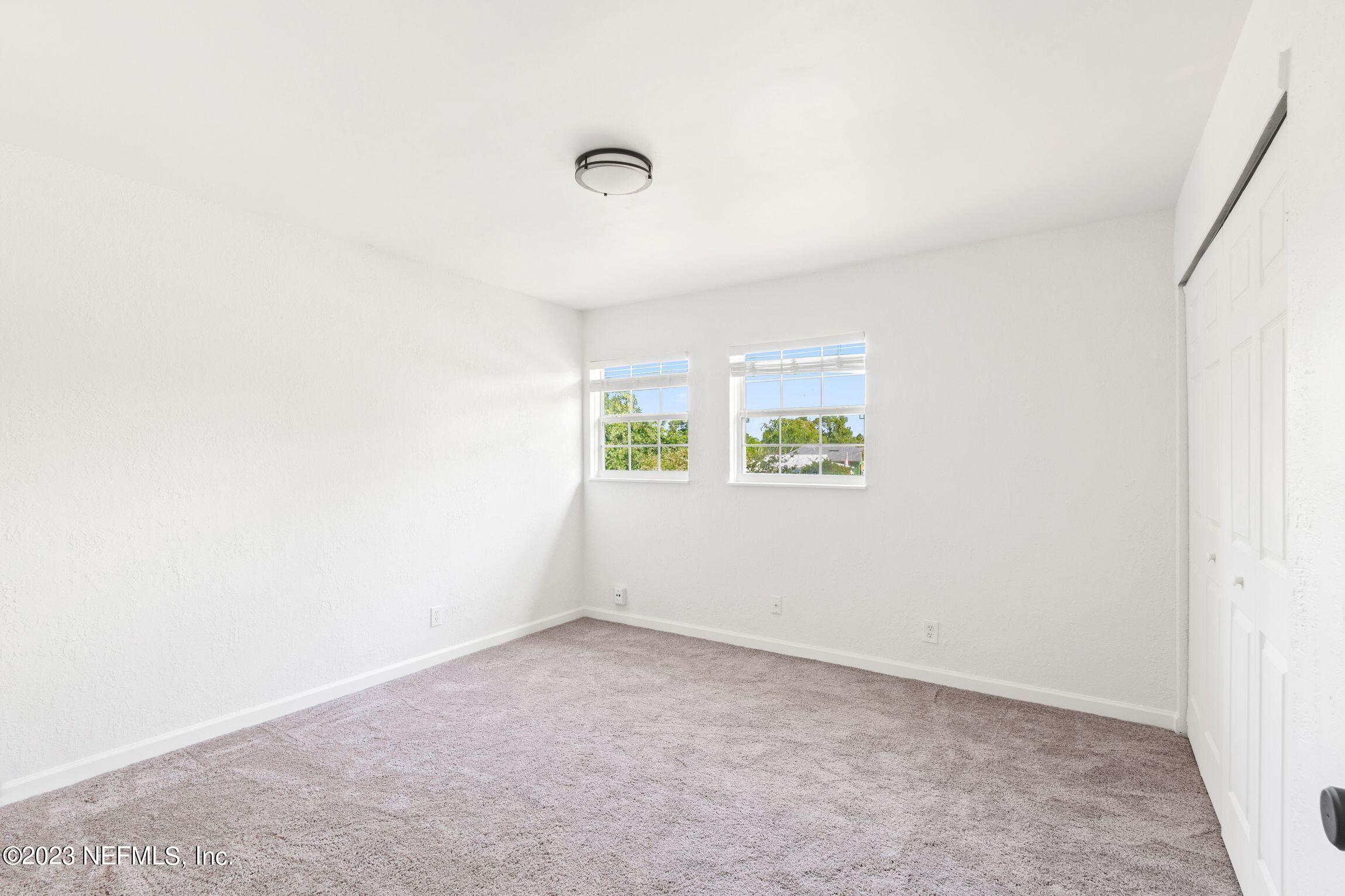 818 Cavalla Road Atlantic Beach, FL 32233 - Photo 23 of 27 an empty room with a window