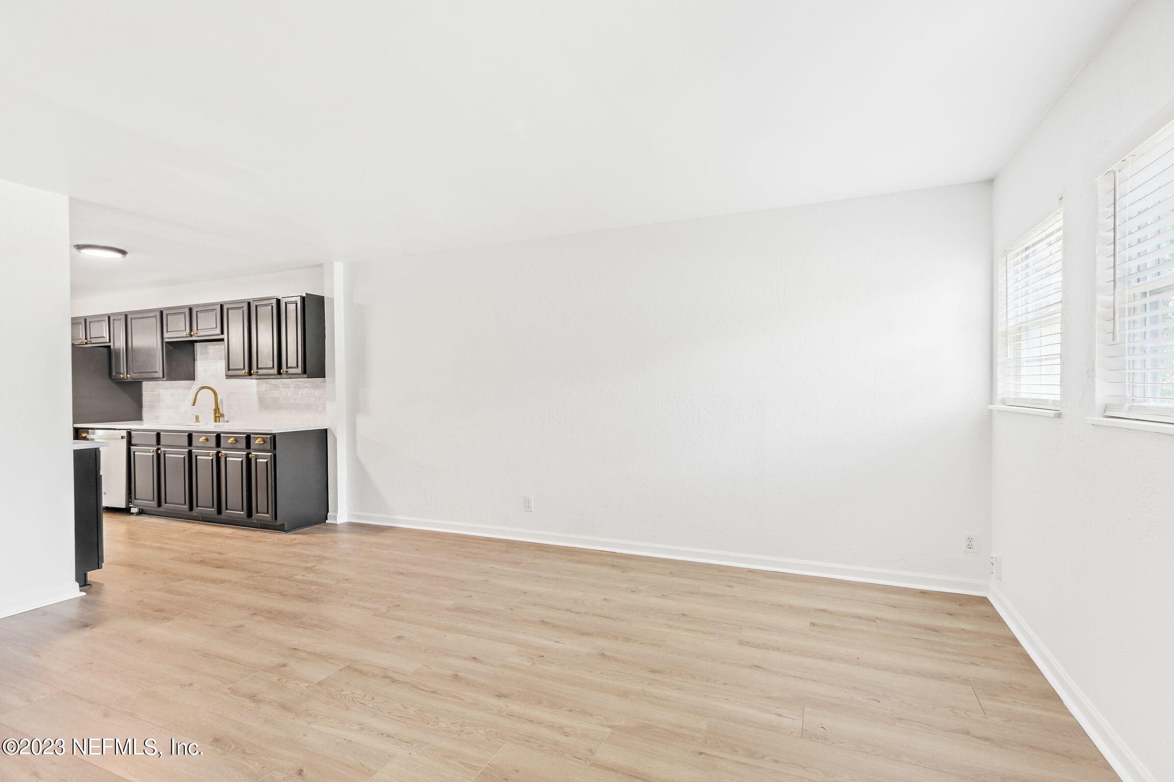 818 Cavalla Road Atlantic Beach, FL 32233 - Photo 4 of 27 a view of a bedroom with furniture and window