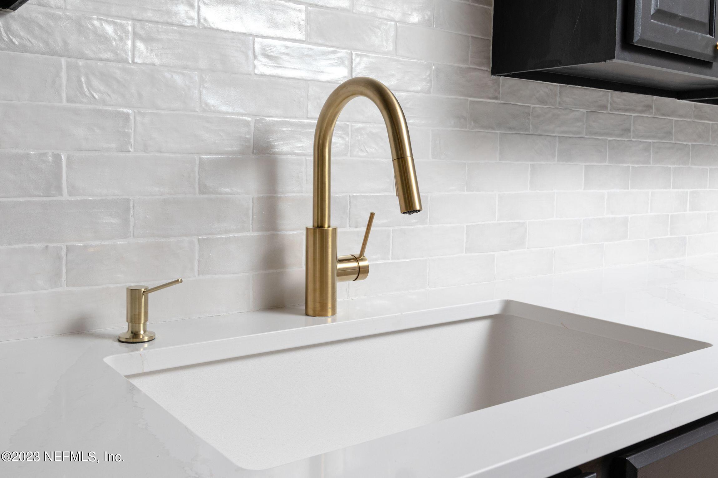 818 Cavalla Road Atlantic Beach, FL 32233 - Photo 9 of 27 a close view of sink and tap