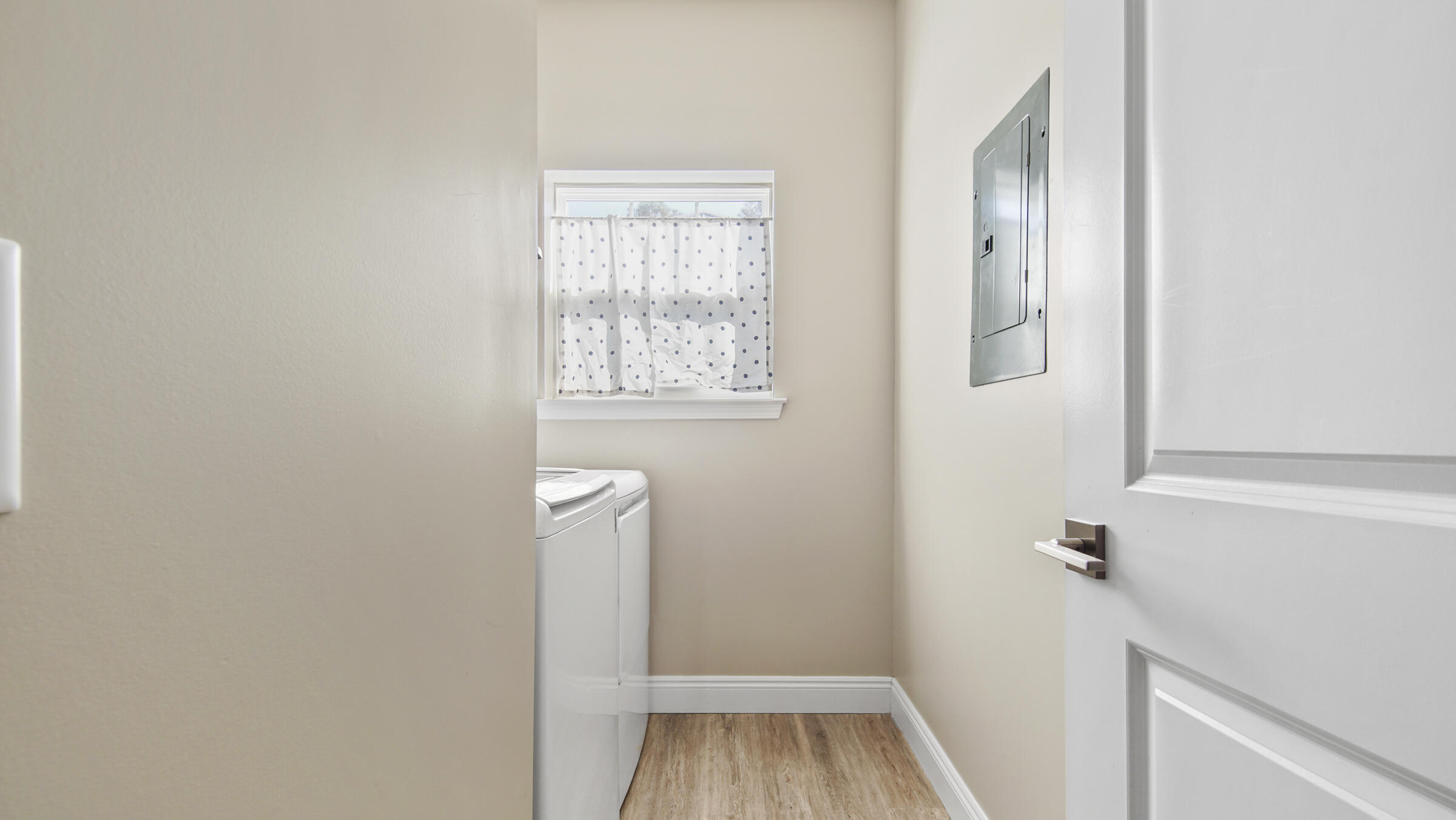 275 Indian Woman Road Santa Rosa Beach, FL 32459 - Photo 17 of 43 a view of front door with wooden floor